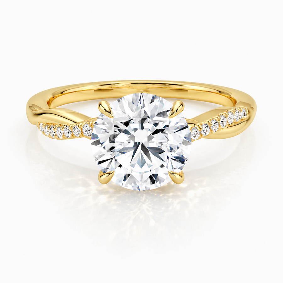 Runder Verlobungsring aus 14 Karat Gelbgold mit Labordiamant und Pavé-Ringschiene und geschwungener Ringschiene