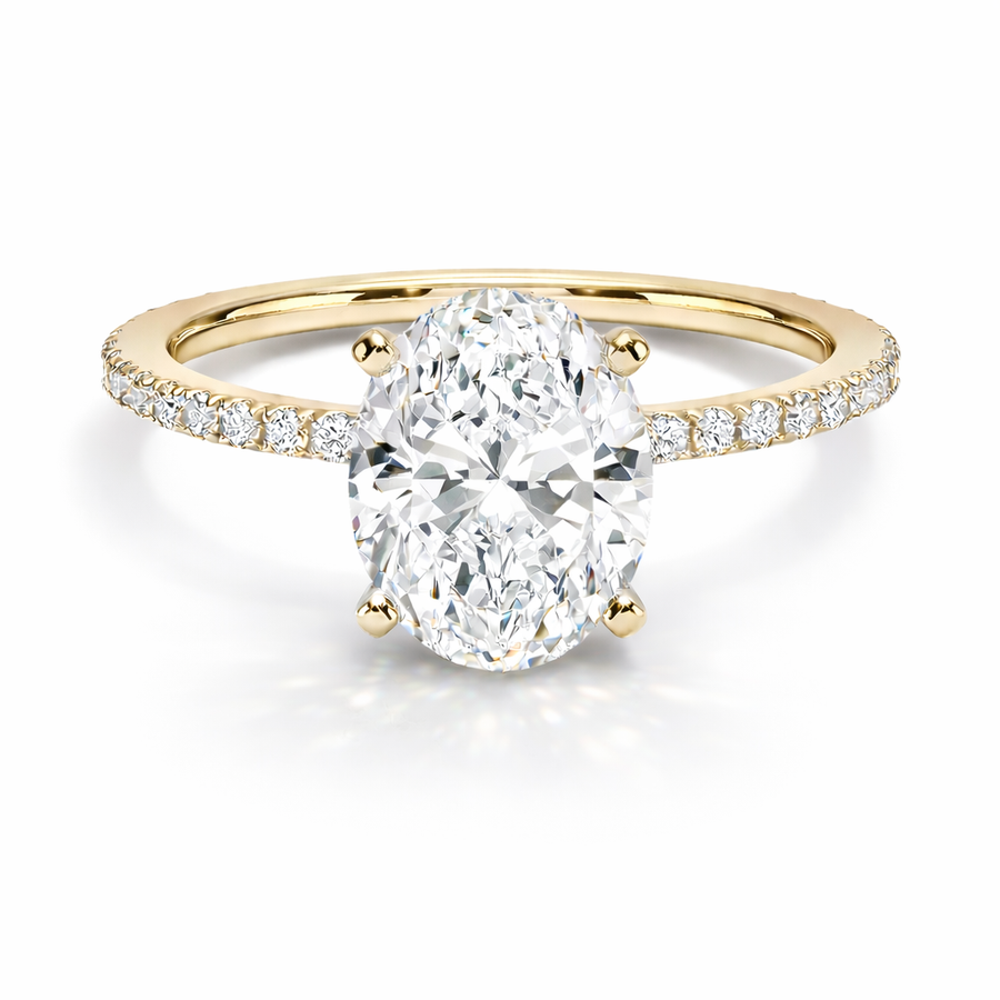 Ovaler Verlobungsring aus 14 Karat Gelbgold mit Diamant und Pavé-Ringschiene