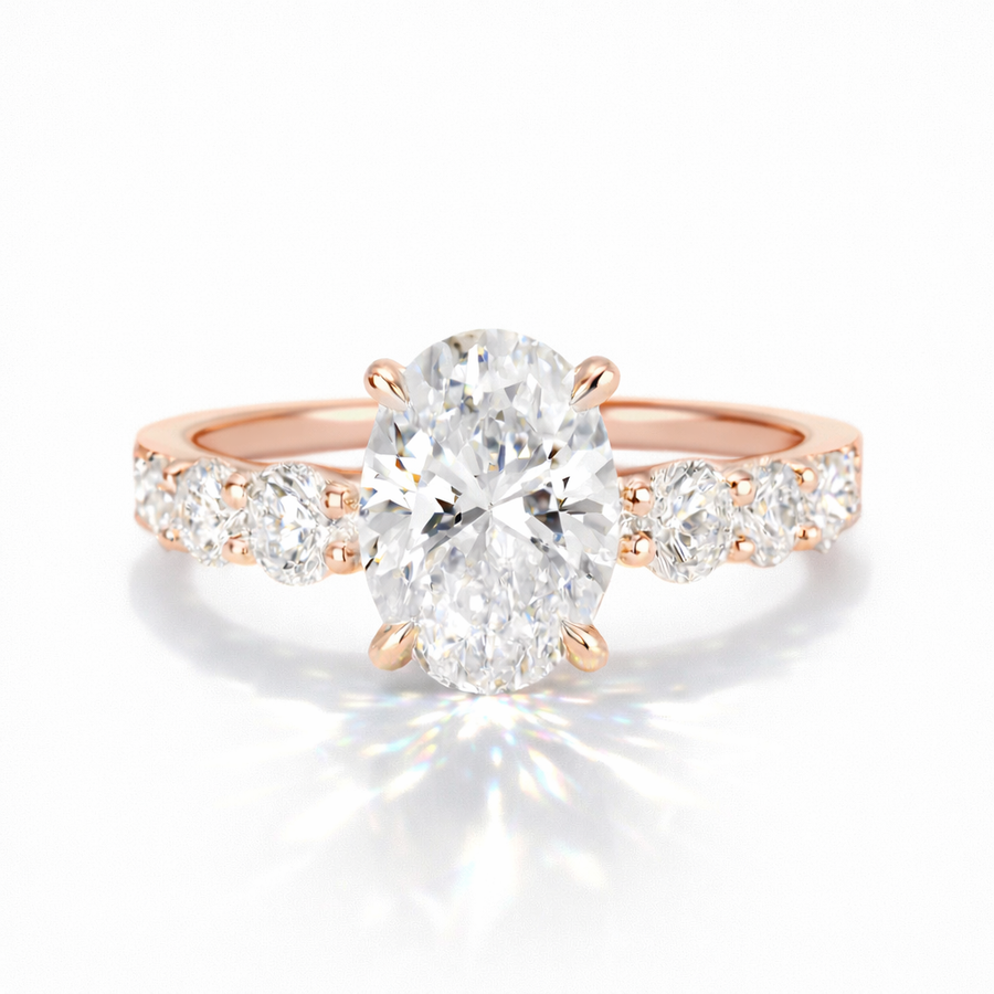 Ovaler Verlobungsring aus 14 Karat Roségold mit Labordiamant und Pavé-Ringschiene