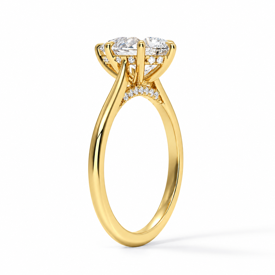 Seitenansicht: Tropfen-Verlobungsring aus Gelbgold mit Labordiamant und Cathedral-Fassung und Hidden Halo