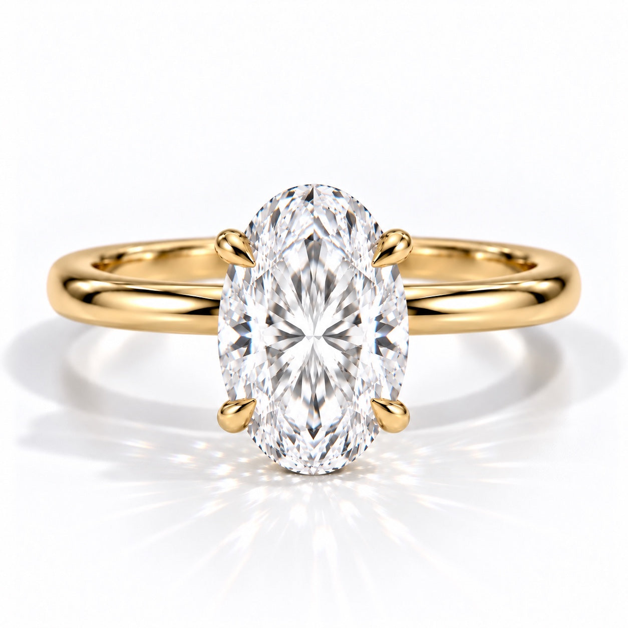 Yellow gold engagement ring with an oval lab-grown diamond